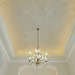 Soft creamy metallic plaster in a dining room tray ceiling